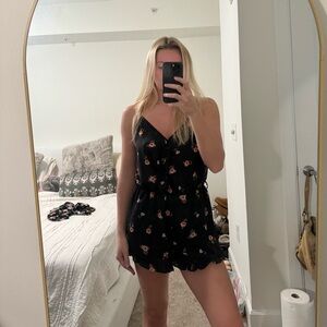 Black romper with flowers